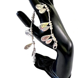 Brighton teardrop swirled charm bracelet.  Silver plated.  Excellent condition
